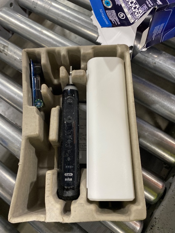 Photo 1 of Oral-B Genius X Limited Rechargeable Electric Toothbrush with 1 Replacement Brush Head, Travel Case, Midnight Black