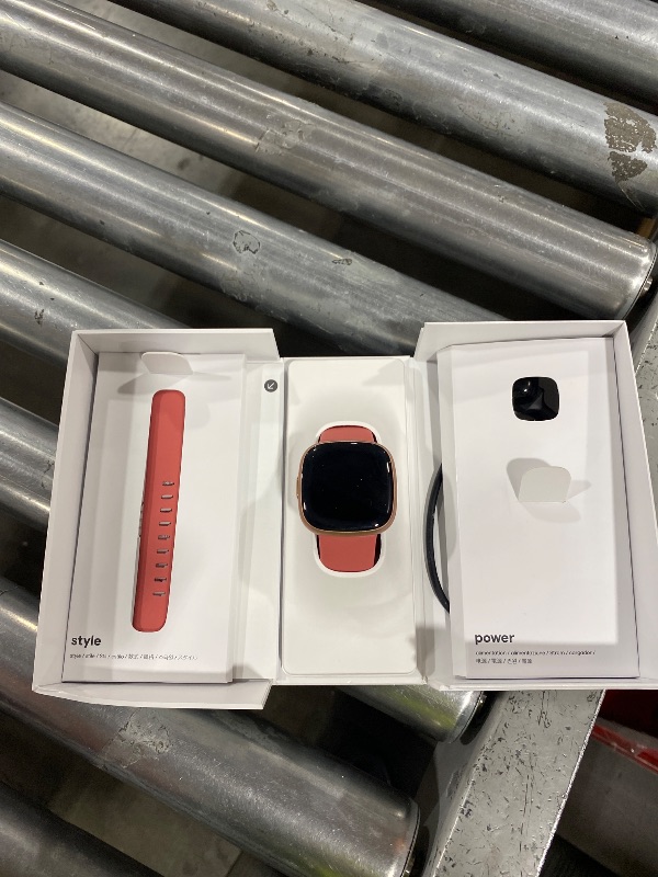 Photo 1 of Fitbit Versa 4 Fitness Smartwatch with Daily Readiness, GPS, 24/7 Heart Rate, 40+ Exercise Modes, Sleep Tracking and more, Pink Sand/Copper Rose, One Size (S & L Bands Included)
