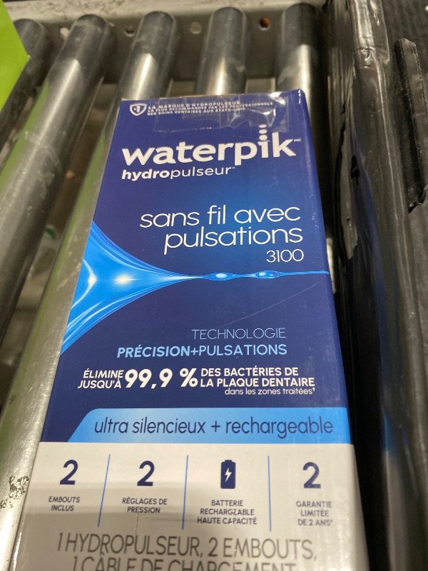 Photo 1 of Waterpik Cordless Pulse Rechargeable Portable Water Flosser for Teeth, Gums, Braces Care and Travel with 2 Flossing Tips, Waterproof for Shower, ADA Accepted, WF-20 Blue, Packaging and Tips May Vary
