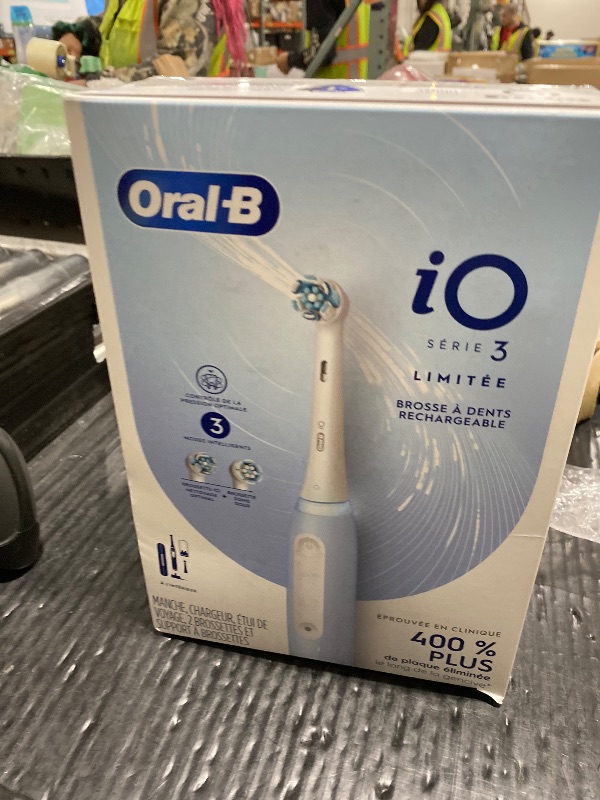Photo 1 of Oral-B iO Deep Clean Rechargeable Electric Powered Toothbrush, Icy Blue with iO Series 3 Limited, 2 Brush Heads and Travel Case - Pressure Sensor to Protect Gums - 3 Cleaning Settings - 2 Minute Timer