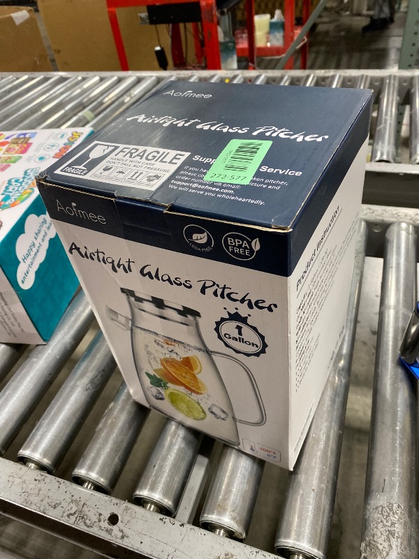 Photo 1 of 1 Gallon 128oz Glass Pitcher,Water Pitcher with Full Seal Lid and Spout, Glass Carafe for Hot/Cold Drink, Water Jug for Iced Tea, Coffee, Juice, Milk, Beverage