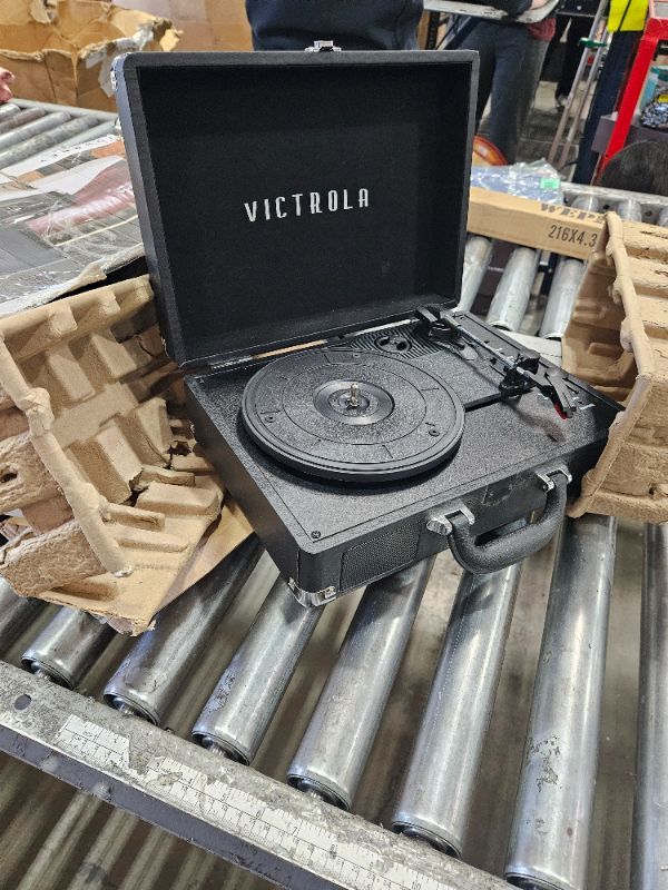 Photo 1 of Victrola Journey Bluetooth Portable Suitcase Record Player – with Built-in Speakers, 3 Speed Vinyl Record Player, RCA Out, Headphone Jack (Black)