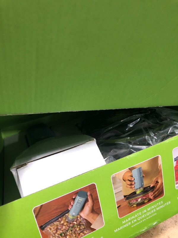 Photo 1 of ***MISSING STORAGE BAG**** FoodSaver Mini Handheld Vacuum Sealer Machine with Marinate Setting & Charging Dock | Cordless Food Vacuum Sealer for Freezer, Storage, Sous Vide, Meal Prep | Blue