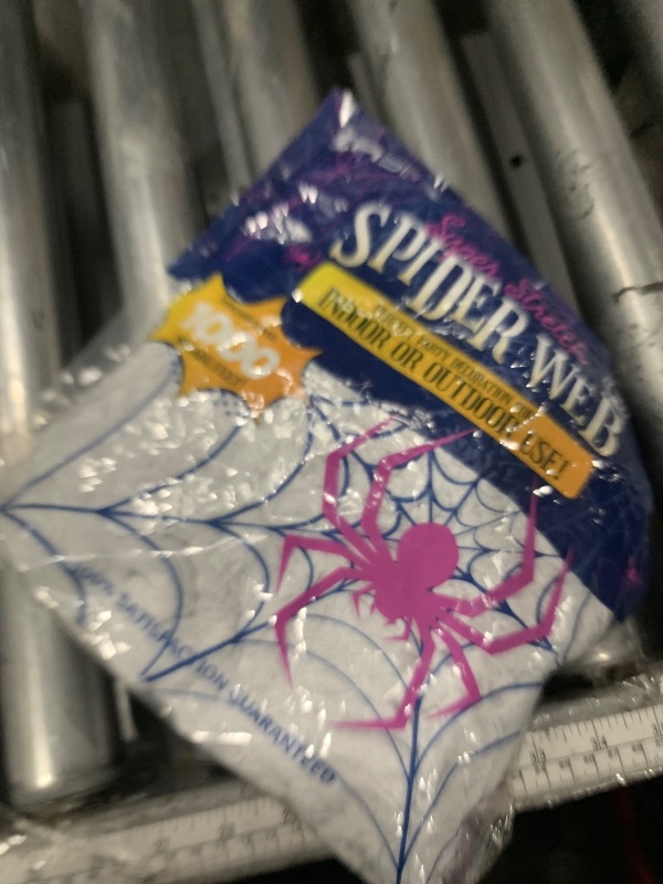 Photo 1 of 1000 sqft Spider Webs Halloween Decorations with 77 Fake Spiders, Super Stretch Cobwebs for Halloween Indoor and Outdoor Decor