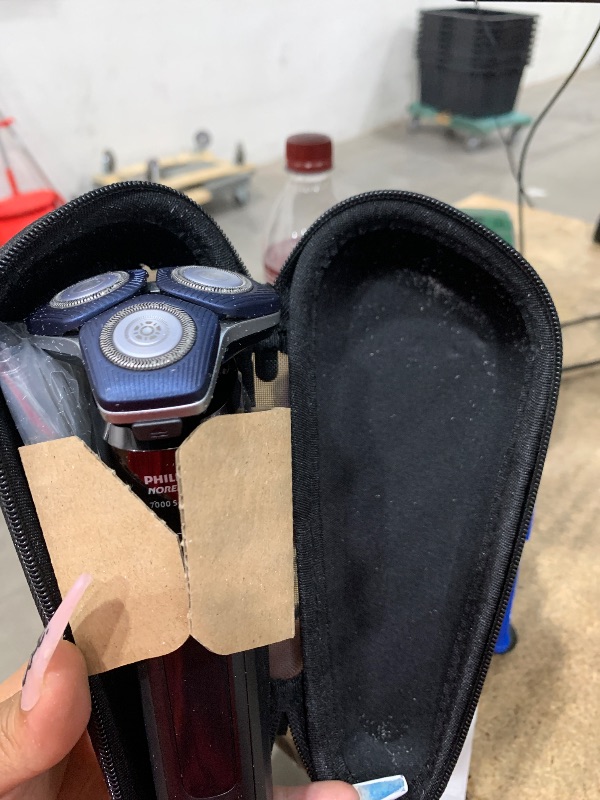 Photo 1 of ***USED /HAS HAIR SEE PHOTOS***
Philips Norelco Shaver 7600, Rechargeable Wet & Dry Electric Shaver with SenseIQ Technology, Quick Clean Pod, Travel Case & Pop-up Trimmer, S7886/84