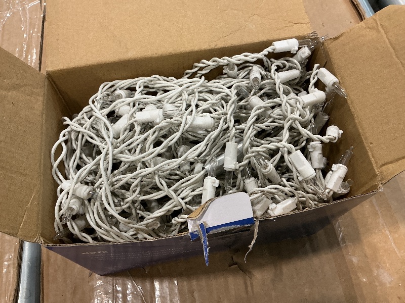View 2 of *dIRTY ITEM* BEEWIN 200 Christmas Icicle Lights, Warm White Clear Bulbs with 23FT Long White Wire, Professional Grade String Lights for Indoor & Outdoor,Xmas,Party, Patio, Courtyard, Window, Fence, Trees Decor
