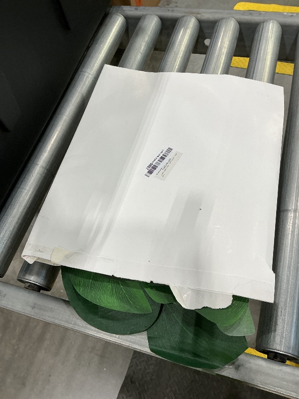 Photo 1 of 100Pcs Palm Leaves Artificial Tropical Monstera Plant Fake Leaves Safari Birthday Decorations,Jungle Theme Party Supplies,Faux Green Leaf for Hawaiian Luau Tiki Aloha Beach BBQ Table Decoration 3 Size