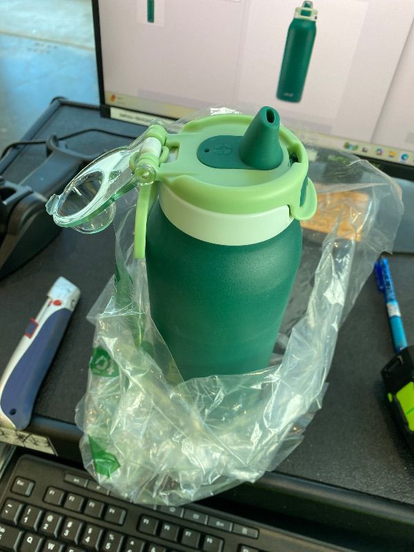 Photo 1 of ***LID LATCH BROKEN*** Ello Pop & Fill 32oz Stainless Steel Water Bottle with Quick Fill Technology, Double Walled and Vacuum Insulated Metal, Leak Proof Locking Lid, Sip and Chug, Reusable, BPA Free, Forest Mist