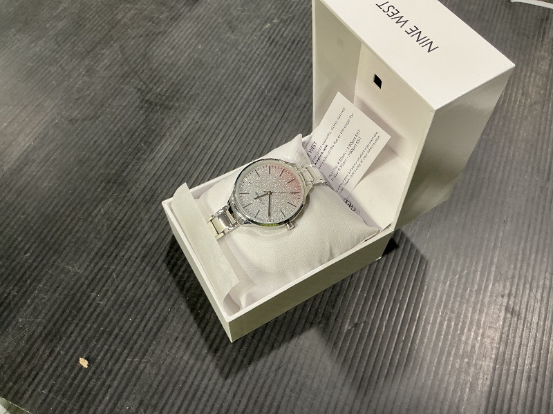 Photo 1 of *Untested*
Nine West Women's Silver-Tone Bracelet Watch, NW/2337OMSV