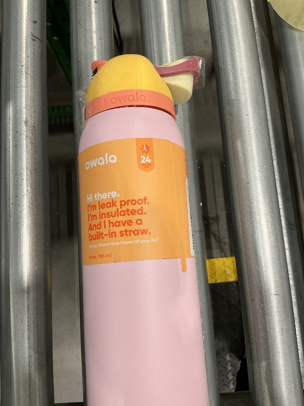 Photo 1 of **MINOR DAMAGE - USED**
Owala FreeSip Insulated Stainless Steel Water Bottle with Straw for Sports and Travel, BPA-Free Sports Water Bottle, 40 oz, Candy Store