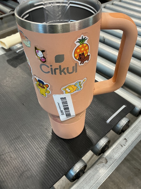 Photo 1 of ***SEE CLERK COMMENTS*** Cirkul 40oz. Apricot Stainless Steel Tumbler with Handle, All-Day StrawSip™, Double-Wall Insulated
