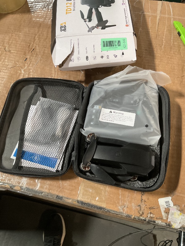 Photo 1 of ***DAMAGED - SEE NOTES/PICTURES*** Toladrone TD12LCD Drone with LCD Screen Remote Control Brushless Motor WiFi Real-time Transmission Drones for Adults Drone with Camera Foldable Quadcopter for Beginners