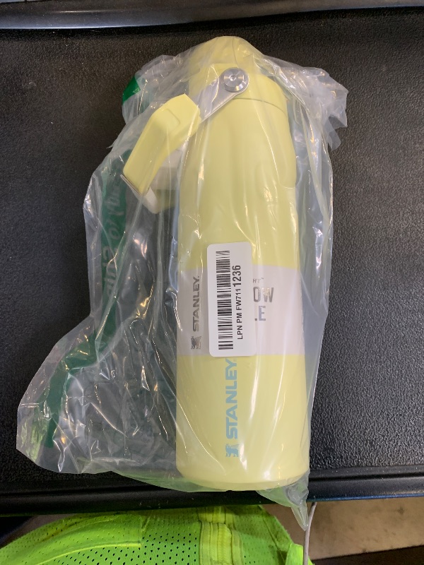 Photo 1 of Stanley IceFlow Fast Flow Water Bottle 24 oz | Angled Spout Lid | Lightweight and Leakproof for Travel and Sports | Insulated Stainless Steel | BPA-Free | Pomelo