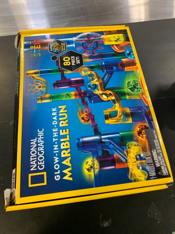 Photo 1 of NATIONAL GEOGRAPHIC Glowing Marble Run – Construction Set with 15 Glow in The Dark Glass Marbles & Storage Bag, STEM Gifts for Boys and Girls, Building Project Toy (Amazon Exclusive)