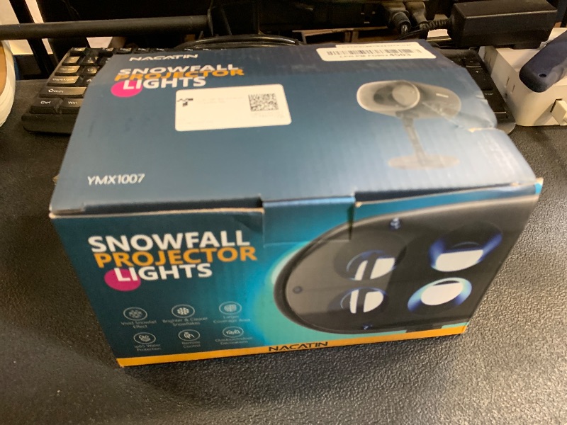 Photo 1 of NACATIN Snowfall LED Projector Lights - 2025 Upgrade Christmas Snowflake Projector Lights Outdoor, Christmas Snow Light,Snow Falling Projector Lamp Dynamic Snow Effect for Xmas, Halloween, Party