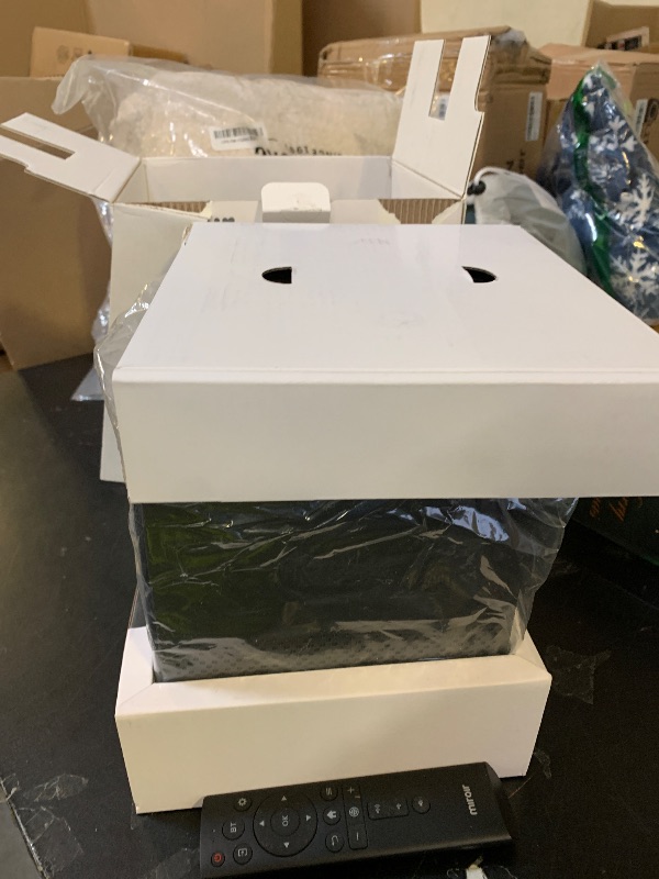 Photo 1 of L710S Smart 1080p Projector with built-in streaming, WiFi, and Bluetooth. Enjoy amazing visuals with Automatic Focus, and Keystone. Digital Zoom and Dolby sound with 2x 5-watt speakers