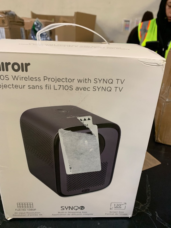 Photo 1 of L710S Smart 1080p Projector with built-in streaming, WiFi, and Bluetooth. Enjoy amazing visuals with Automatic Focus, and Keystone. Digital Zoom and Dolby sound with 2x 5-watt speakers