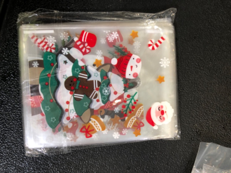 Photo 1 of 100 PCS Self-sealing Christmas Cellophane Treat Bags(4x4 Inch) Plastic Santa Goodie Candy Cookie Loot Gifts Ziplock Bags Bulk Pouches for Christmas Party Favors Supplies Decorations Holiday Xmas Decor