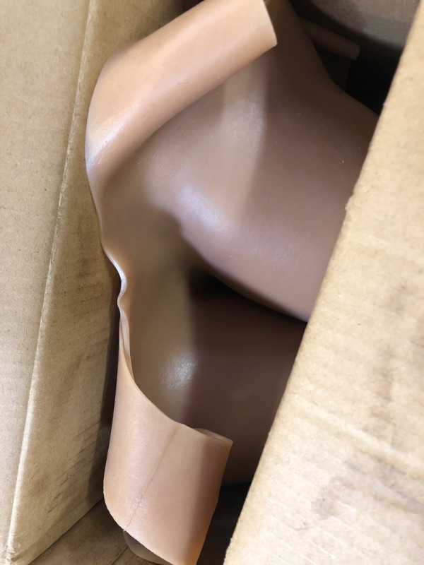 Photo 1 of rubber breast cover