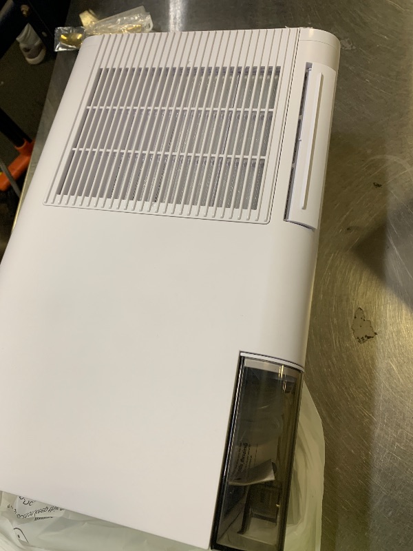 Photo 1 of Dehumidifiers for Home, 2000 Sq.Ft Small Dehumidifier with 3.3ft Drain Hose, 2.5L Tank, Timer Sleep Mode, Portable Dehumidifier for Basement, Bedroom, Bathroom (Pure White)