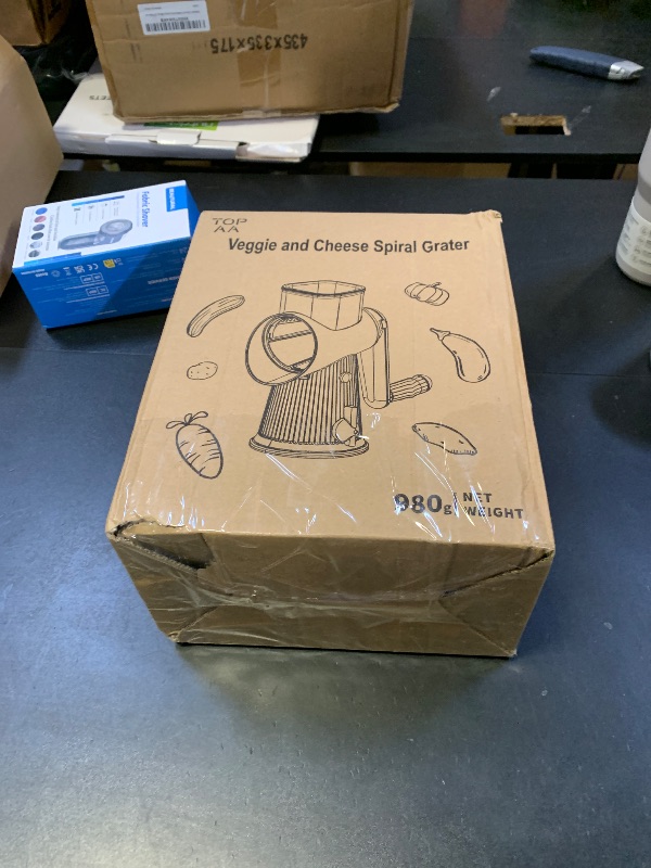 Photo 1 of TOPAA Rotary Cheese Grater with Handle Vegetable Shredder with 5 Blades, Round Mando line Slicer and Food Chopper for Kitchen (White)