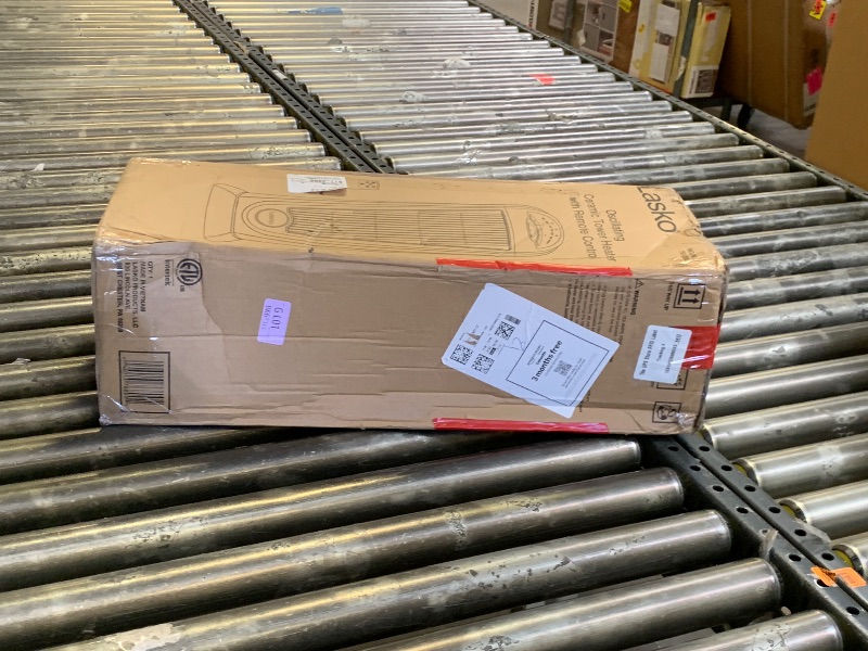 Photo 1 of Lasko 1500W Ceramic Tower Space Heater with Remote, Thermostat, Timer & Widespread Oscillation, Portable Electric Heater for Indoor Use, Bedroom & Living Room, 751320