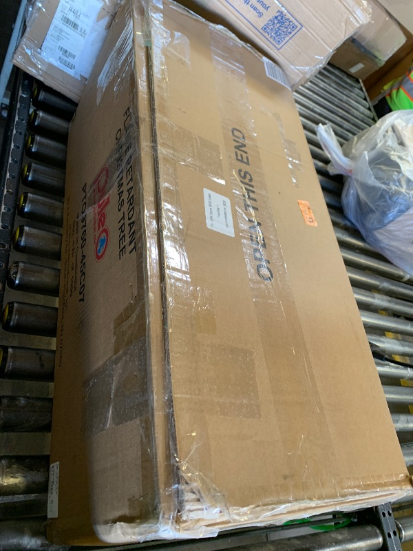 Photo 1 of Puleo International 4.5ft Pre-Lit Potted Flocked Arctic Fir Christmas Tree with 70 Clear Lights, 419 Realistic Dense Snow Flocked Branch Tips, Easy Setup Artificial Trees with Sturdy Stand