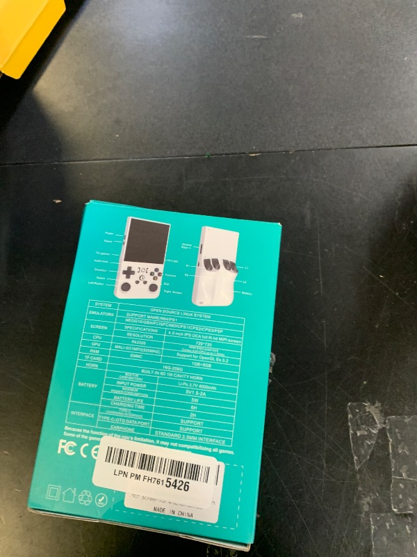 Photo 1 of ?R36MAX 4000mAh Portable Rechargeable Handheld Retro Game Console,Comfort Non-Slip Handheld Standing Retro Game Console with 64G TF Car,4.0-inch Screen,for Office,Black