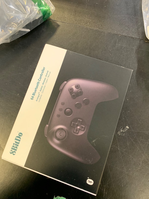 Photo 1 of 8BitDo 64 Bluetooth Controller for Analogue 3D, Switch, Switch 2, Windows, and Android (Black)