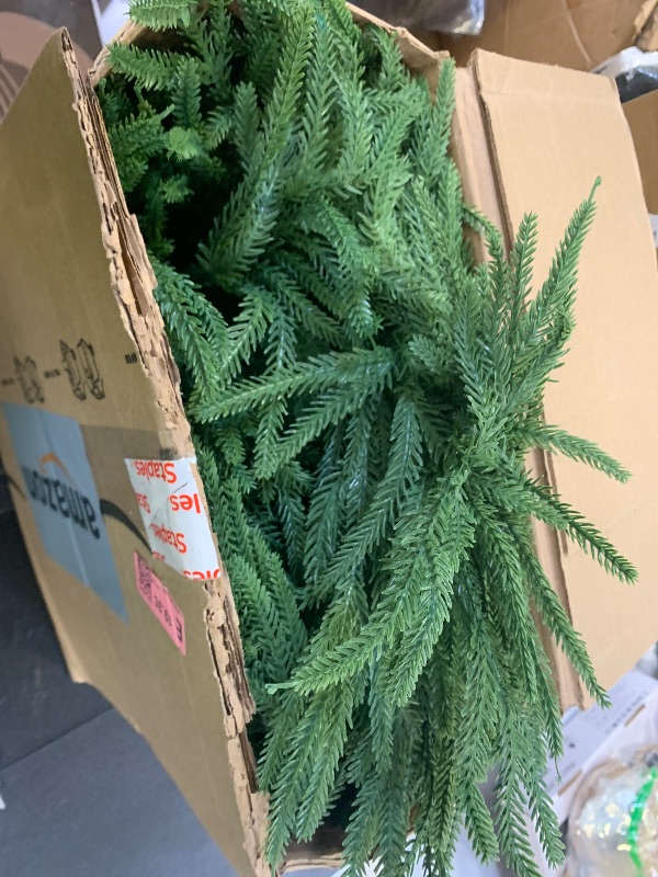 Photo 1 of Artificial Norfolk Pine Garland, Realistic Christmas Greenery Garland for Mantle, Staircase, Banister, Fireplace, Wall, Door, Table, Indoor & Outdoor Holiday Winter Decortions (9 Ft-2pcs)