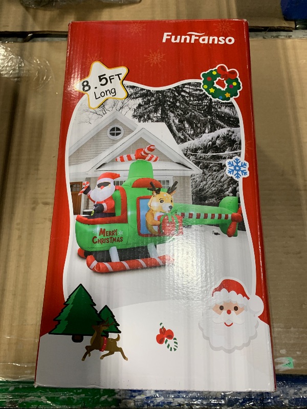 Photo 1 of *** VERY USED *** 8.5 FT Long Christmas Inflatable Airplane Outdoor Decorations, Blow Up Santa Claus Helicopter with LED Lights, Christmas Santa and Reindeer Flying Airplane for Xmas Decor, Lawn, Yard Holiday Party