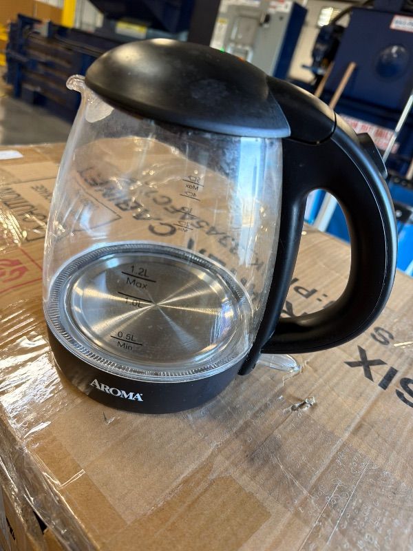 Photo 1 of *UNTESTED*
AROMA® 1.2L / 5-Cup Glass Electric Kettle with Cordless Pouring, Trigger-Release Lid, Automatic Shut-off, Black (AWK-151B)
**USED**