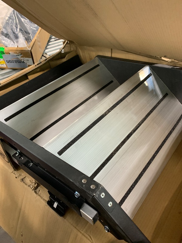 Photo 1 of Lippert Components 733931 Solid Step Quad Step for RV and Travel Trailer Entry Doorway Black, 26-inch