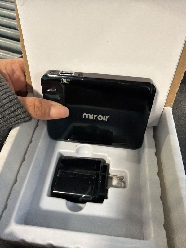 Photo 1 of (RENEWED) Miroir M125 LED Portable Projector ; 70" Image ; 854 x 480p Resolution; HDMI ; DLP Technology for clear and vivid images; 2 - Year Warranty; 1080p compatible