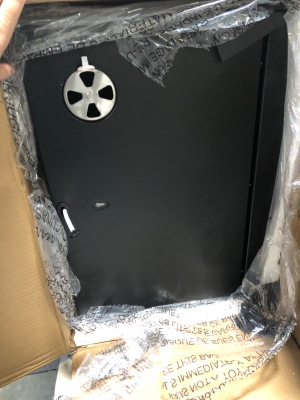 Photo 1 of ******MINOR DENTS******Masterbuilt® 40-inch Digital Electric Vertical BBQ Smoker with Side Wood Chip Loader