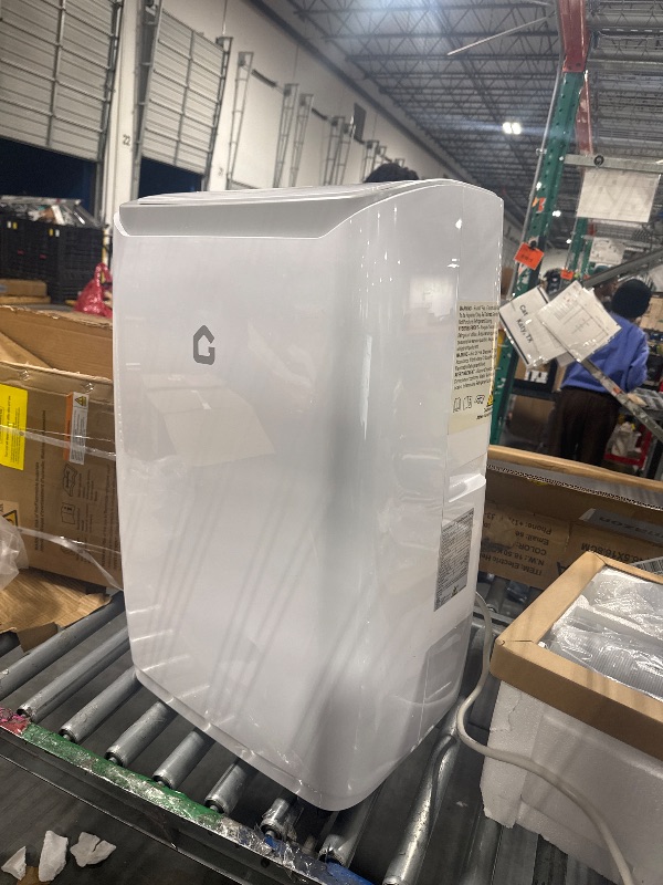 Photo 1 of  *********TURNS ON PERFECTLY******* 12000 BTU Portable Air Conditioner Cools up to 550 Sq.Ft, 3-in-1 Quiet Portable AC Unit with Remote Control & Installation Kits for Large Room, 3 Speed, Auto Swing, 24H Timer