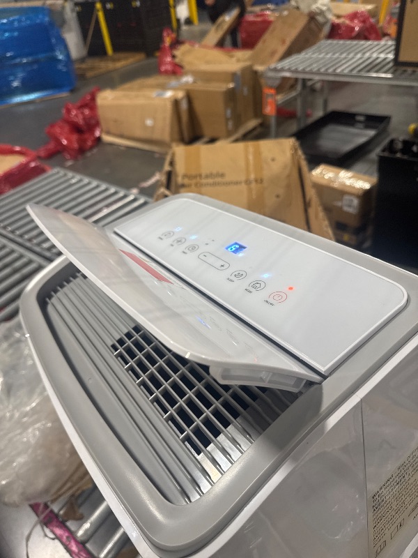 Photo 1 of  *********TURNS ON PERFECTLY******* 12000 BTU Portable Air Conditioner Cools up to 550 Sq.Ft, 3-in-1 Quiet Portable AC Unit with Remote Control & Installation Kits for Large Room, 3 Speed, Auto Swing, 24H Timer