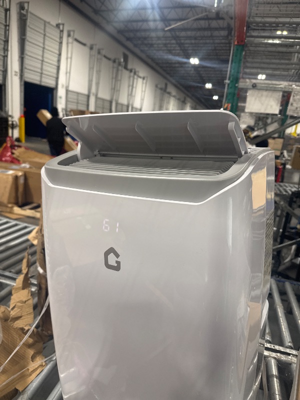 Photo 1 of  *********TURNS ON PERFECTLY******* 12000 BTU Portable Air Conditioner Cools up to 550 Sq.Ft, 3-in-1 Quiet Portable AC Unit with Remote Control & Installation Kits for Large Room, 3 Speed, Auto Swing, 24H Timer