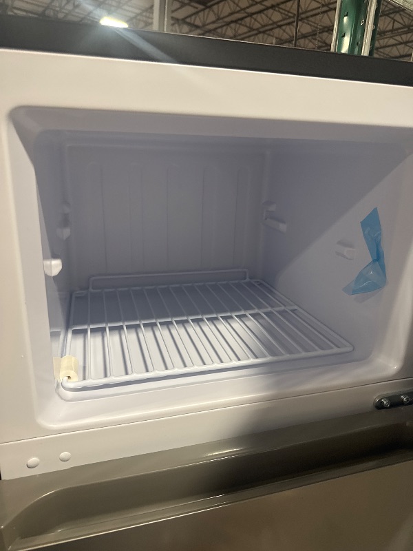 Photo 1 of  *********TURNS ON PERFECTLY******* Frigidaire, 2 Door Apartment Size Refrigerator with Freezer, 7.5 cu ft, Adjustable Spill-Proof Shelves, Door & Crisper Bins, Platinum Silver
