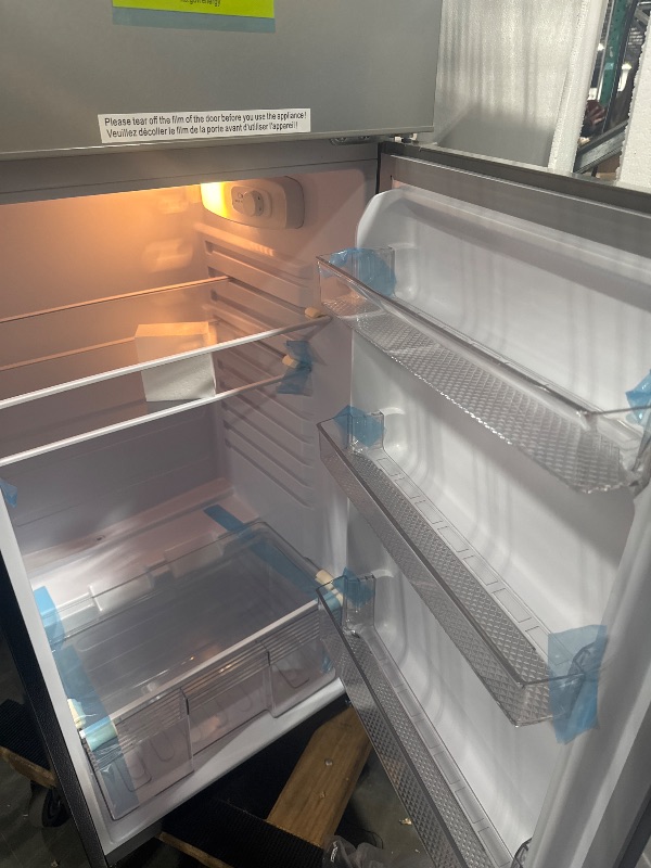 Photo 1 of  *********TURNS ON PERFECTLY******* Frigidaire, 2 Door Apartment Size Refrigerator with Freezer, 7.5 cu ft, Adjustable Spill-Proof Shelves, Door & Crisper Bins, Platinum Silver