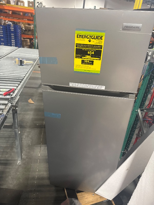 Photo 1 of  *********TURNS ON PERFECTLY******* Frigidaire, 2 Door Apartment Size Refrigerator with Freezer, 7.5 cu ft, Adjustable Spill-Proof Shelves, Door & Crisper Bins, Platinum Silver