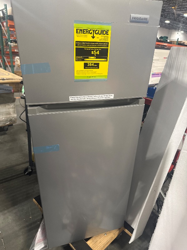 Photo 1 of  *********TURNS ON PERFECTLY******* Frigidaire, 2 Door Apartment Size Refrigerator with Freezer, 7.5 cu ft, Adjustable Spill-Proof Shelves, Door & Crisper Bins, Platinum Silver