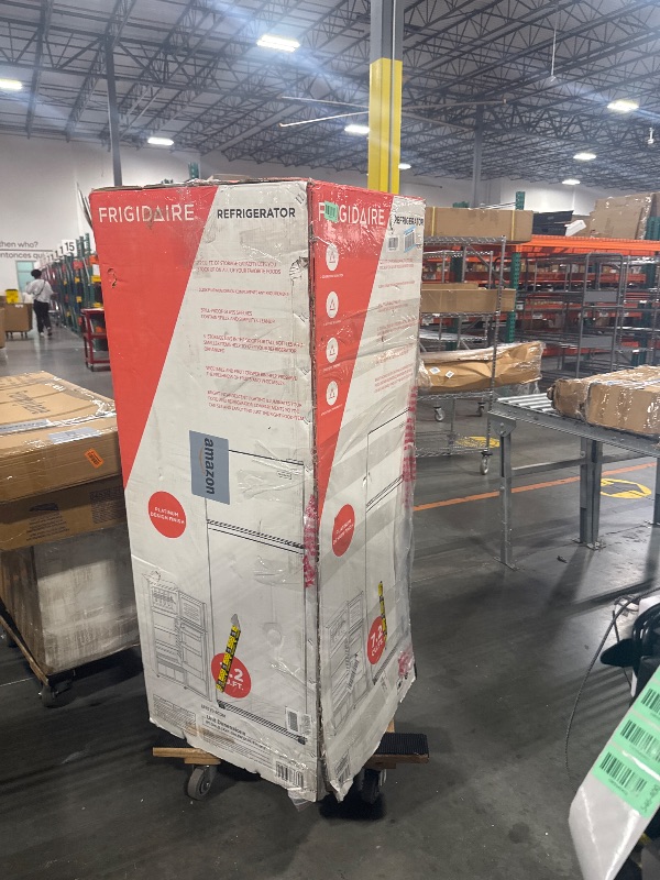 Photo 1 of  *********TURNS ON PERFECTLY******* Frigidaire, 2 Door Apartment Size Refrigerator with Freezer, 7.5 cu ft, Adjustable Spill-Proof Shelves, Door & Crisper Bins, Platinum Silver