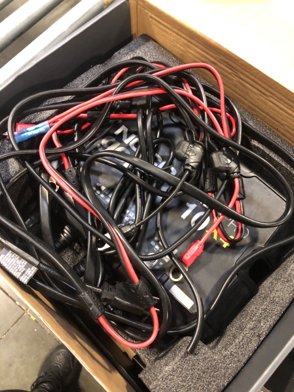 Photo 1 of ***MAJOR DAMAGE*** NOCO Genius GENPRO10X4: 4-Bank, 40A Onboard Battery Charger - 10A Per Bank, 12V Waterproof Marine Charger with Overcharge Protection & Temperature Compensation – for Lead-Acid & Lithium Batteries