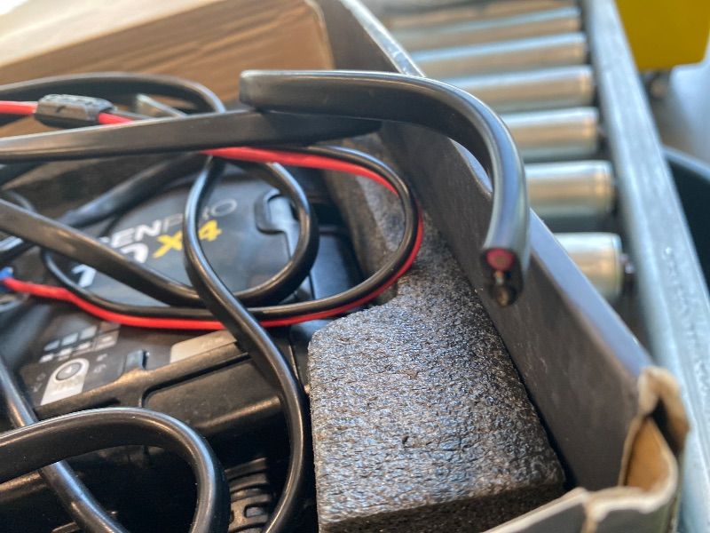 Photo 1 of ***MAJOR DAMAGE*** NOCO Genius GENPRO10X4: 4-Bank, 40A Onboard Battery Charger - 10A Per Bank, 12V Waterproof Marine Charger with Overcharge Protection & Temperature Compensation – for Lead-Acid & Lithium Batteries