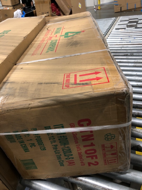 Photo 1 of (2 boxes)National Tree Company 12 ft Pre-Lit Dunhill Fir Artificial Christmas Tree, 1,500 Clear Lights, 7,794 Tips, Includes Stand, Green