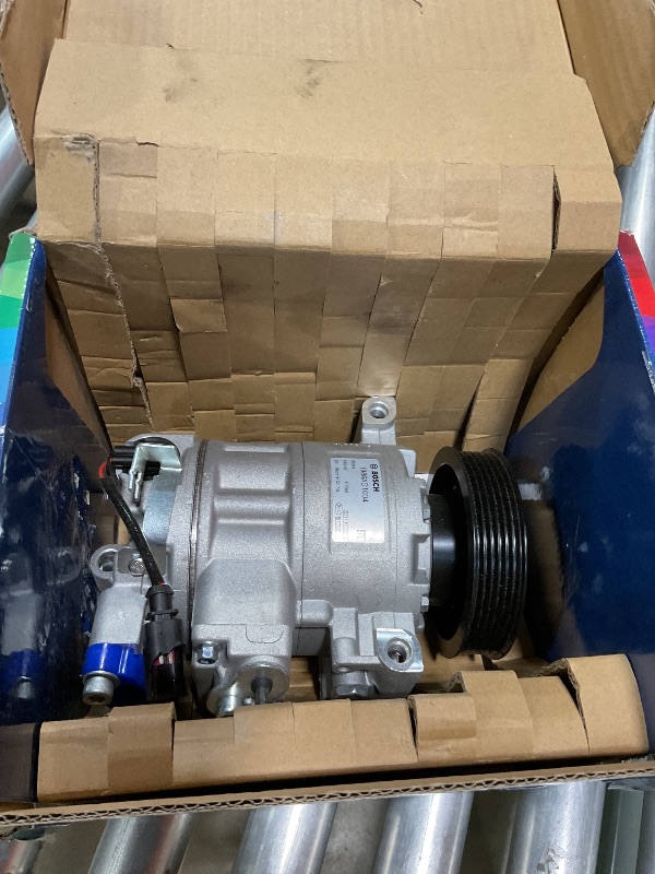 Photo 1 of **MINOR DAMGE ** BOSCH 1986AD1004 New A/C Compressor - Compatible with Select Audi A3, A3 Quattro, Q3, Q3 Quattro, Q7, TT, TT Quattro, TTS Quattro; Volkswagen Eos, Golf, Jetta, Passat