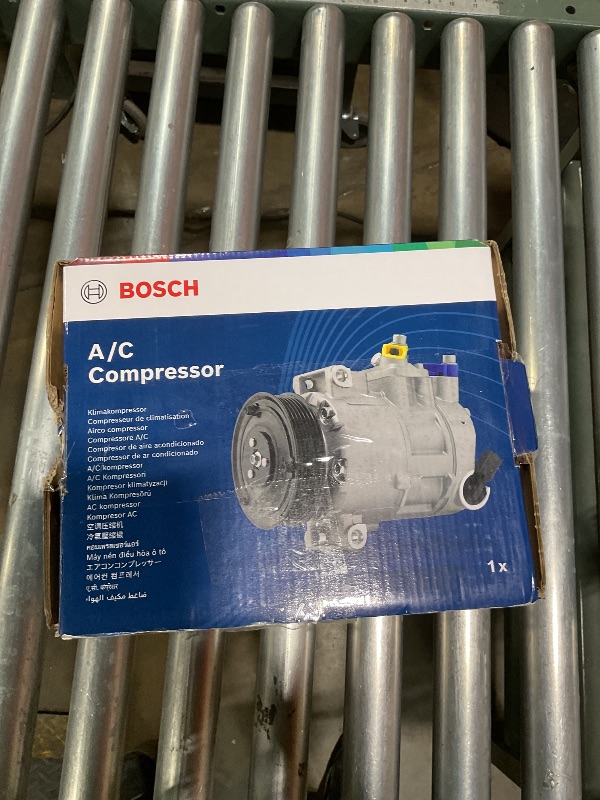 Photo 1 of **MINOR DAMGE ** BOSCH 1986AD1004 New A/C Compressor - Compatible with Select Audi A3, A3 Quattro, Q3, Q3 Quattro, Q7, TT, TT Quattro, TTS Quattro; Volkswagen Eos, Golf, Jetta, Passat