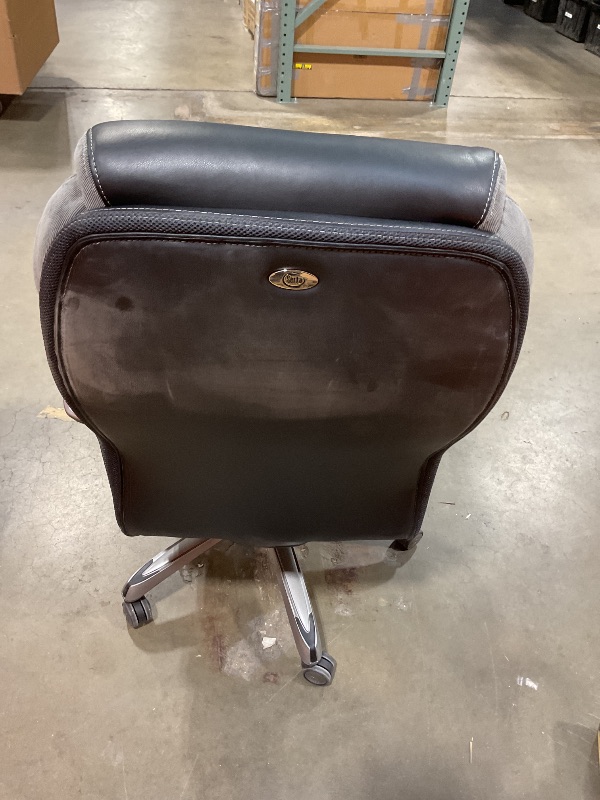 Photo 1 of **DIRT**Serta Jackson Big and Tall Executive Home Office Chair with Smart Layers Technology, Wide Seat Cushion, Modern Comfy DeskChairs with Rolling Swivel Wheels, Bonded Leather, Black