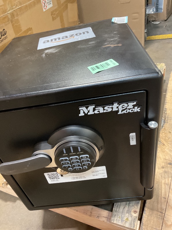 Photo 1 of **DIRT. SCRAPES**Safe Masterlock model stw123gtc